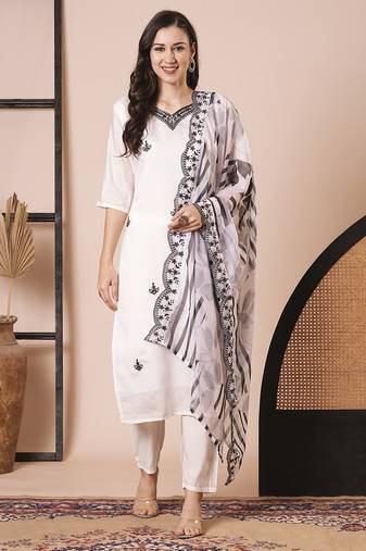 White pv chanderi fabric embroidery work with printed stitched suit