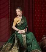Dark green paithani silk blend woven design saree