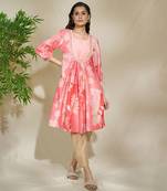 Peach pintexed tunic with pearl cutdana work beige pants