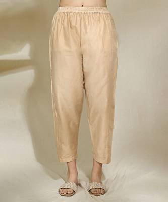 Peach pintexed tunic with pearl cutdana work beige pants 3