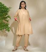 Beige red pink tunic set - tagai work highlighted zari sequence work on pants sleeves & back