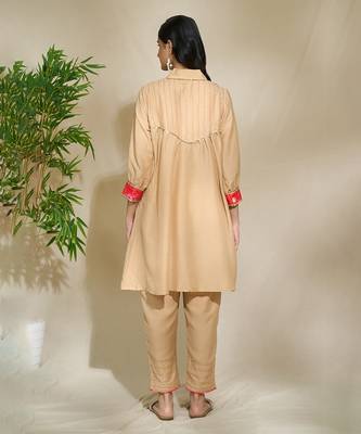 Beige red pink tunic set - tagai work highlighted zari sequence work on pants sleeves & back 2