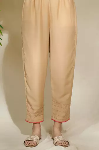 Beige red pink tunic set - tagai work highlighted zari sequence work on pants sleeves & back