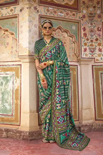 Silk Blend patola print saree in dark green