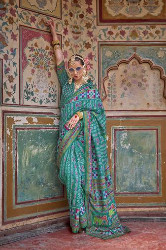Silk Blend patola print saree in teal