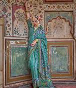 Silk Blend patola print saree in teal