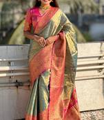 Blue zari woven tissue silk saree with unstitched blouse piece