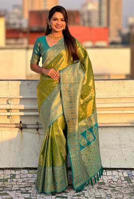 Green zari woven tissue silk saree with unstitched blouse piece 1