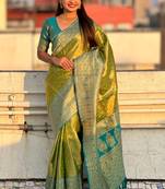 Green zari woven tissue silk saree with unstitched blouse piece