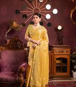 Yellow organza silk with woven zari work