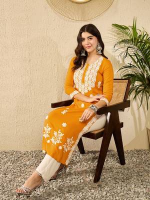 women yellow viscose rayon solid embroidered straight kurta 1