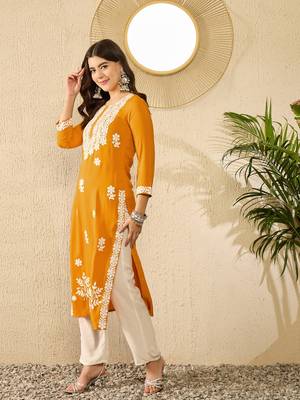 women yellow viscose rayon solid embroidered straight kurta 3