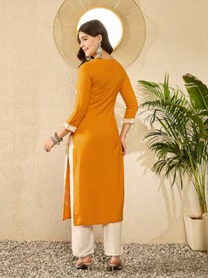 women yellow viscose rayon solid embroidered straight kurta 4
