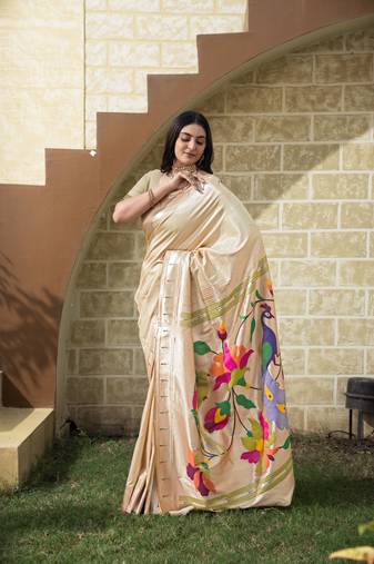 Cream paithani peacock floral and geometric motifs woven with zari saree