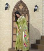 Green paithani peacock floral and geometric motifs woven with zari saree