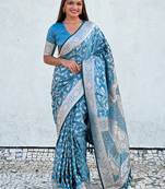 Blue zari woven Banarasi silk blend saree with unstitched blouse piece