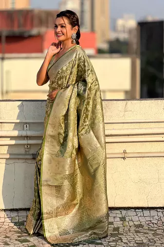 Green zari woven Banarasi silk blend saree with unstitched blouse piece
