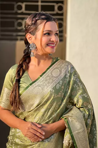 Green zari woven Banarasi silk blend saree with unstitched blouse piece