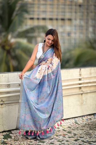 Blue zari woven tussar silk saree with unstitched blouse piece