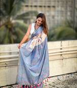 Blue zari woven tussar silk saree with unstitched blouse piece