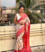 Red zari woven tussar silk saree with unstitched blouse piece