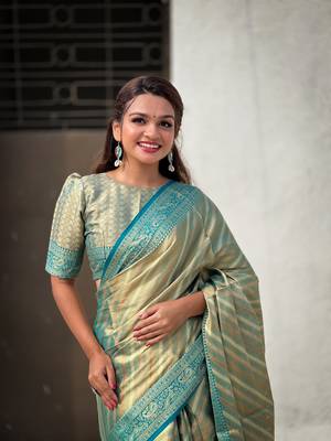 Blue zari woven tissue silk saree with unstitched blouse piece 4