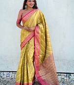 Yellow zari woven tissue silk saree with unstitched blouse piece