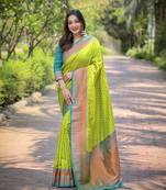 Parrot green zari woven silk women's saree with blouse piece