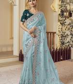 Party wear light green organza saree with satin blouse