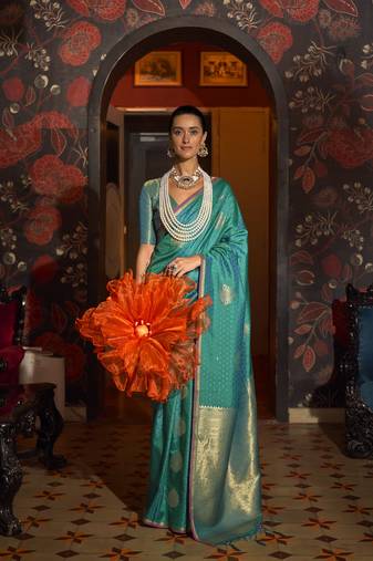 Teal Woven silk blend Saree With Unstitched Blouse Piece