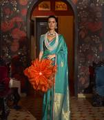 Teal Woven silk blend Saree With Unstitched Blouse Piece