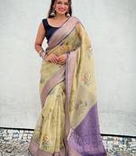 Yellow floral printed tissue silk saree with unstitched blouse piece