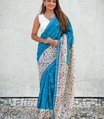 Blue floral print silk saree with unstitched blouse piece