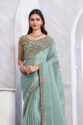 sea green silk blend beautiful embellished saree with embroidered blouse