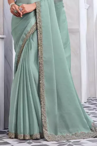 sea green silk blend beautiful embellished saree with embroidered blouse