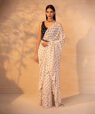 Off white printed ruffle saree with belt set 1