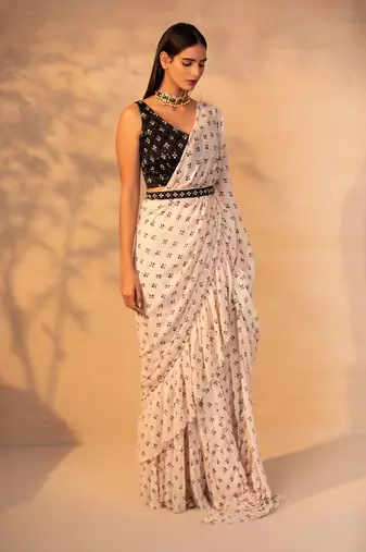 Off white printed ruffle saree with belt set