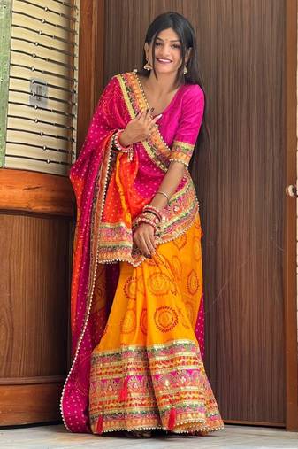 Pink bandhani print silk saree  with lace border and unstitched blouse piece