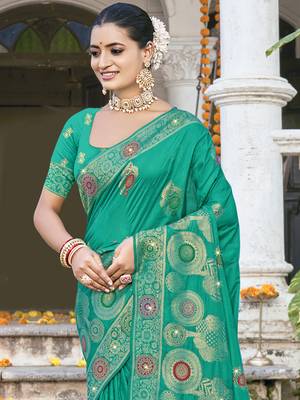 Sangam prints teal green silk woven work festival saree 2