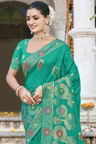 Sangam prints teal green silk woven work festival saree