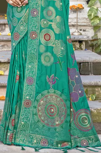 Sangam prints teal green silk woven work festival saree