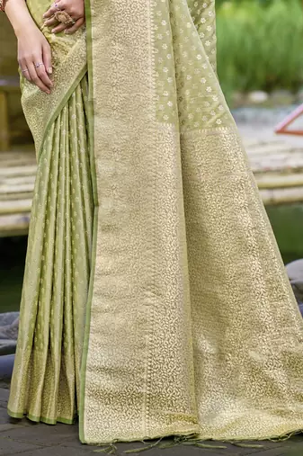 Sangam prints olive green silk woven work festival saree