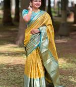 Yellow kanchipuram tissue silk saree with unstitched blouse piece
