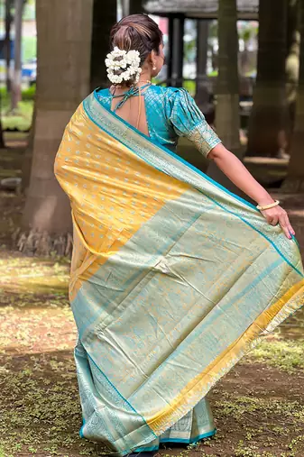 Yellow kanchipuram tissue silk saree with unstitched blouse piece