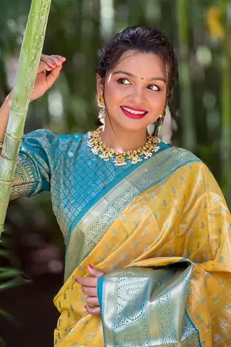 Yellow kanchipuram tissue silk saree with unstitched blouse piece