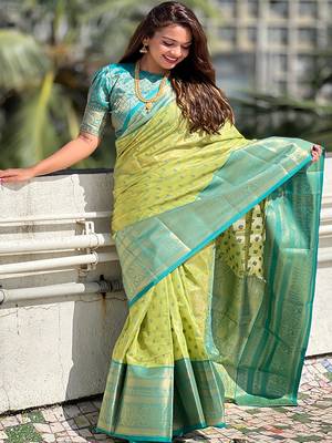 Green kanchipuram tissue silk saree with unstitched blouse piece 1