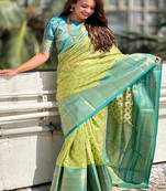 Green kanchipuram tissue silk saree with unstitched blouse piece