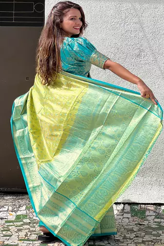 Green kanchipuram tissue silk saree with unstitched blouse piece