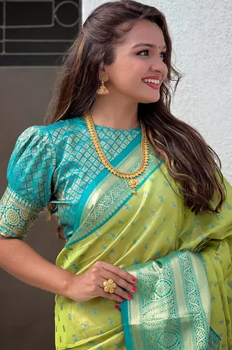 Green kanchipuram tissue silk saree with unstitched blouse piece