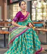 Turquoise printed cotton saree with blouse piece